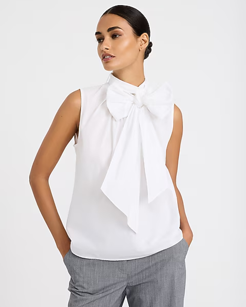 White sleeveless blouse with oversized neck bow small/medium